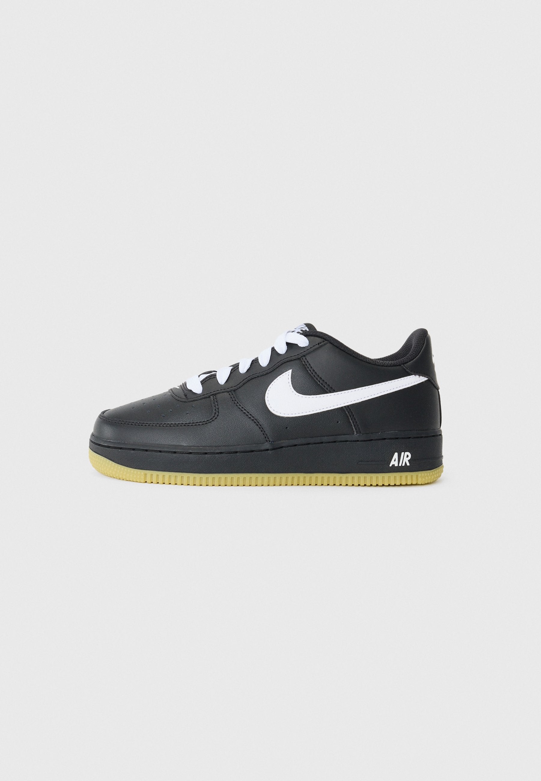 Classic Nike Air Force 1 Unisex Trainers: Iconic Black and White Styling
