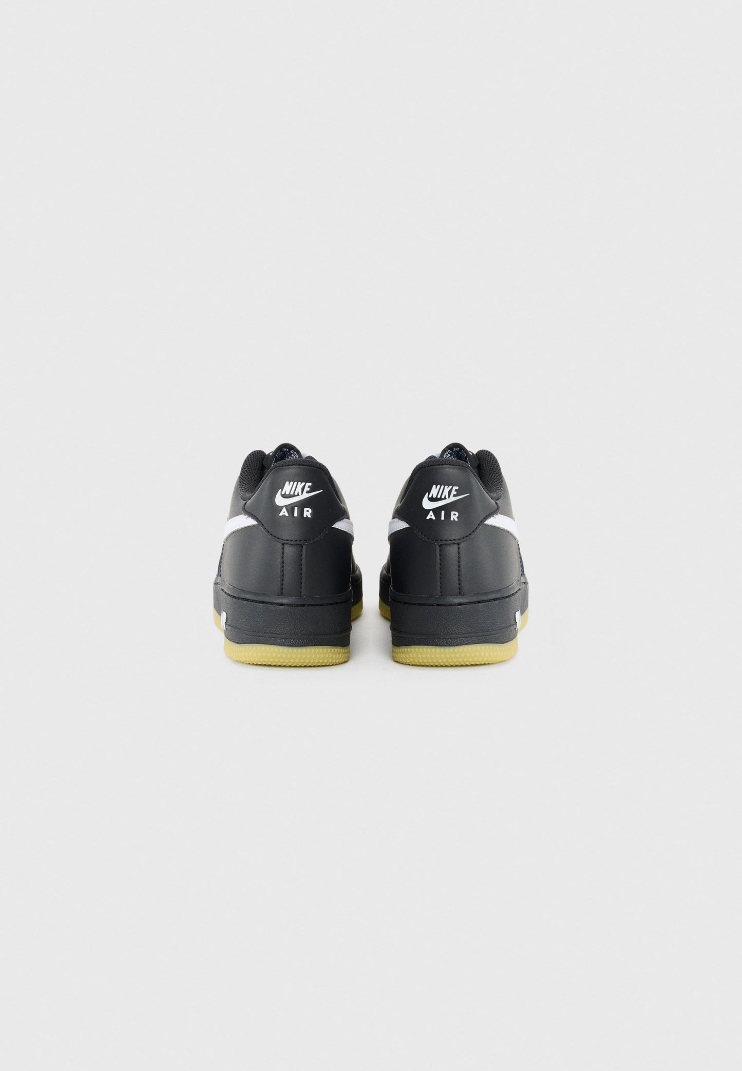Classic Nike Air Force 1 Unisex Trainers: Iconic Black and White Styling