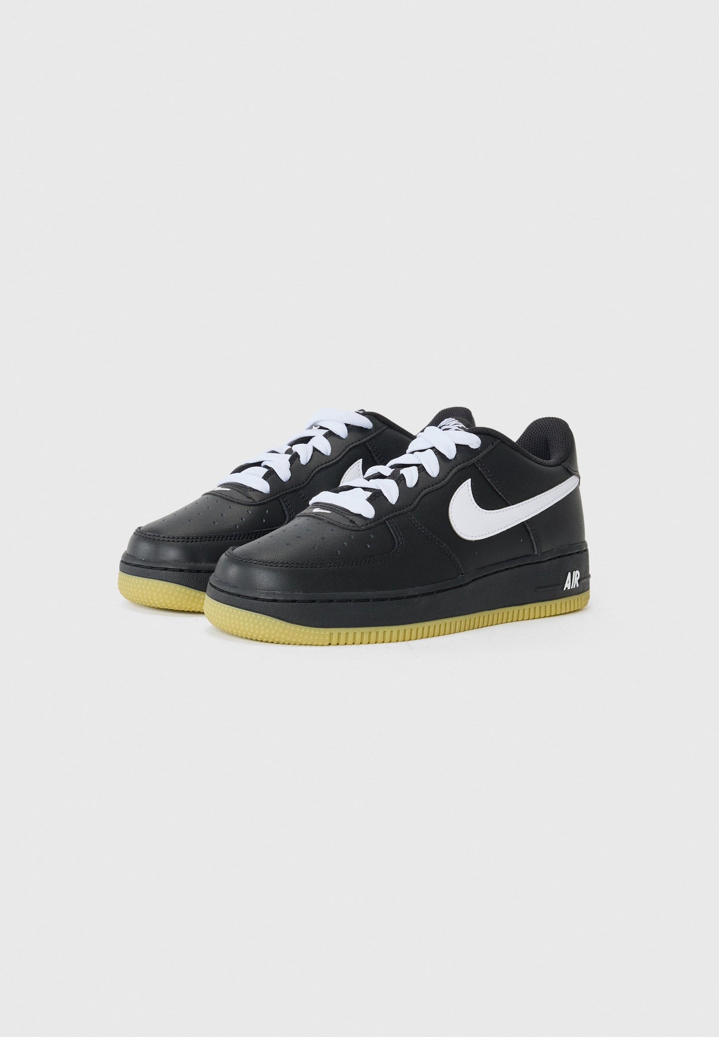 Classic Nike Air Force 1 Unisex Trainers: Iconic Black and White Styling